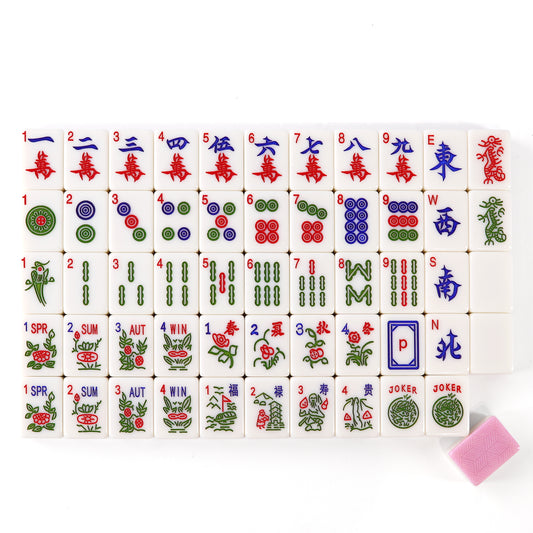 close up of transparent acrylic mahjong tiles with heart inspired pink details