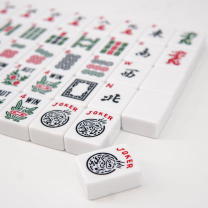 Full display of 166 acrylic mahjong tiles from the Magic Red American Mahjong set