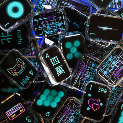 full set of black cyber style transparent acrylic mahjong tiles arranged in a dense flat lay