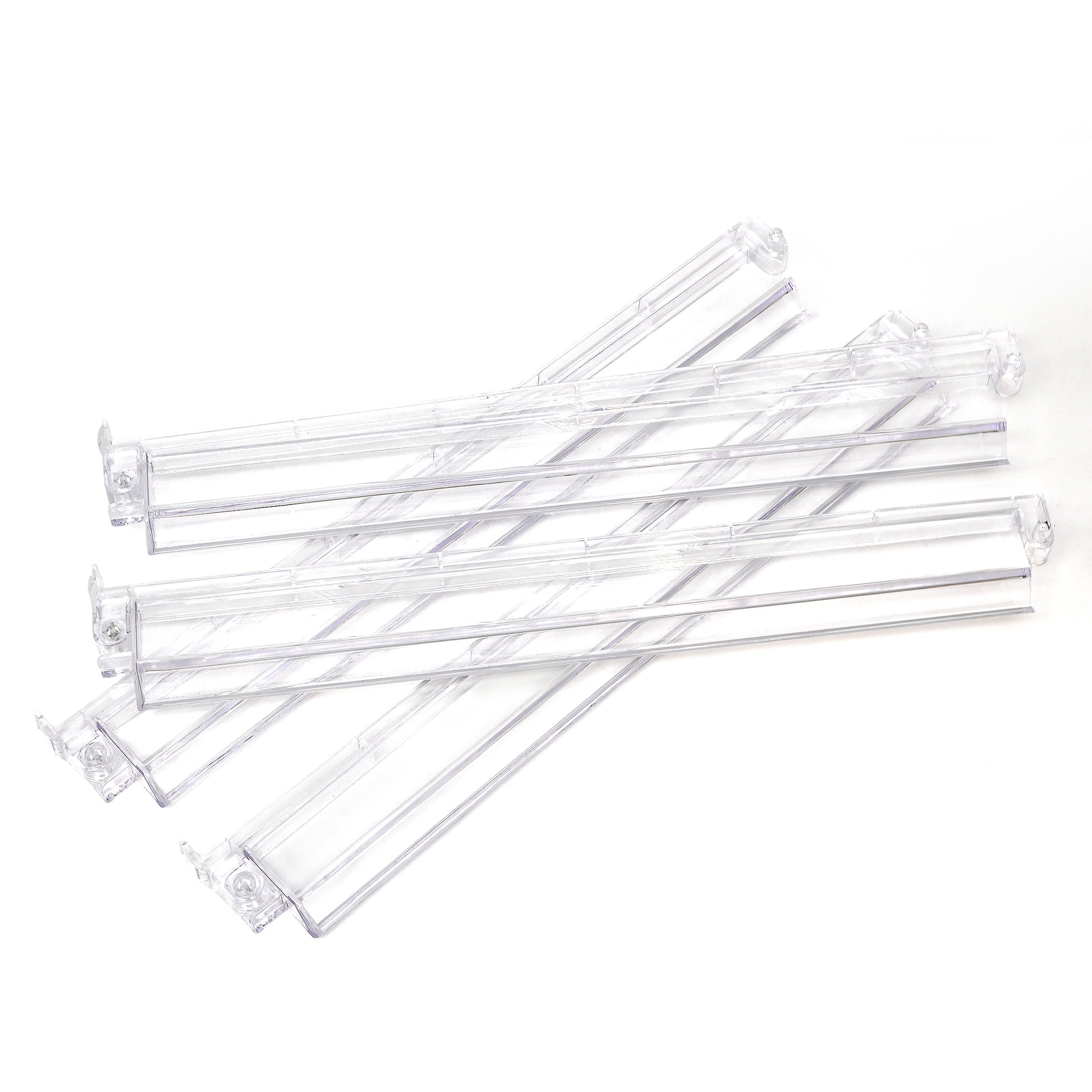 Set of four clear acrylic Mahjong racks with pushers arranged neatly