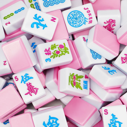 Close-up of Cotton Candy American Mahjong tiles with pink and blue designs