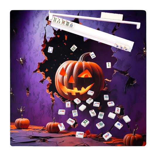 mahjong tiles placed on a halloween pumpkin themed mat during gameplay