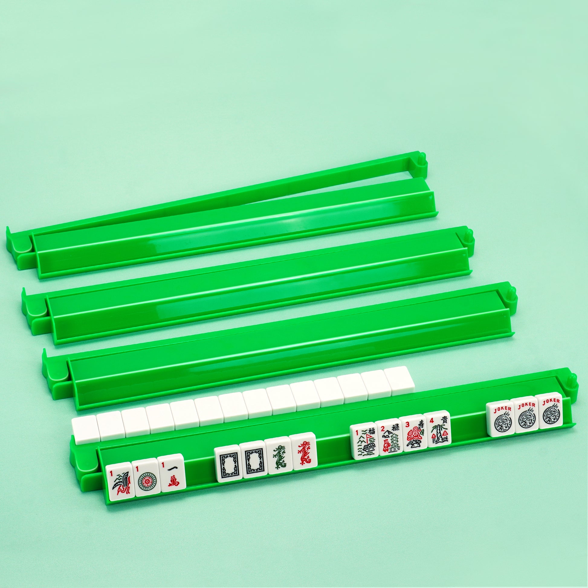 Green acrylic mahjong rack and pusher set with 4 racks for American Mahjong tiles