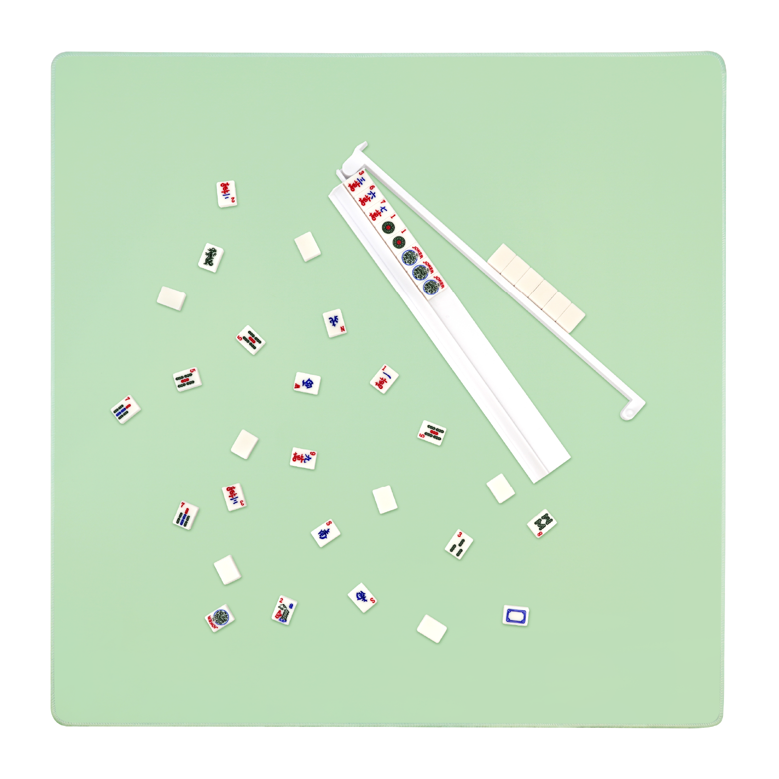 Mahjong mat set up for gameplay with tiles and racks