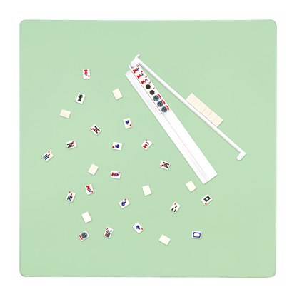 Mahjong mat set up for gameplay with tiles and racks
