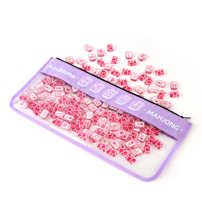 open lavender clear zippered mahjong bag with mahjong tiles spilling out