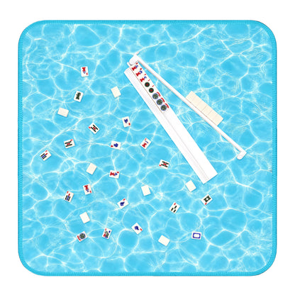 Mahjong play mat with blue water pool design, tiles, and white acrylic rack for American Mahjong
