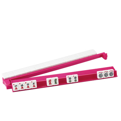 Side view of pink acrylic mahjong rack with attached pusher and tiles