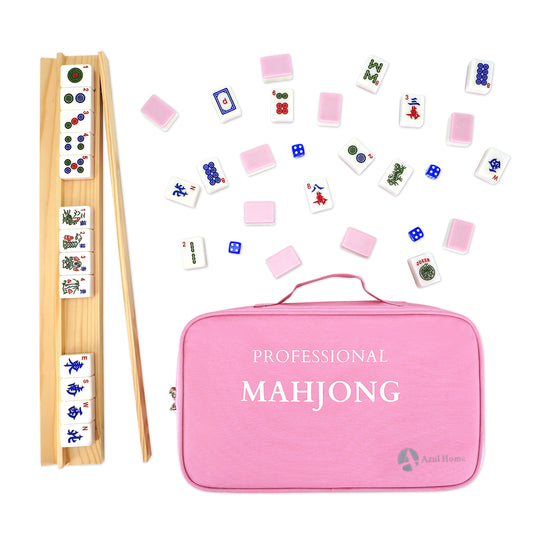 Pink mahjong set accessories with tiles, dice, scoring sticks, racks, and carrying case