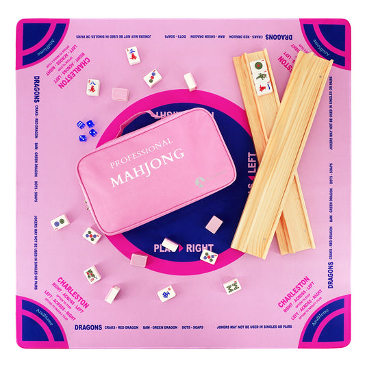 Top view of pink mahjong set with play mat, tiles, racks, and carrying case