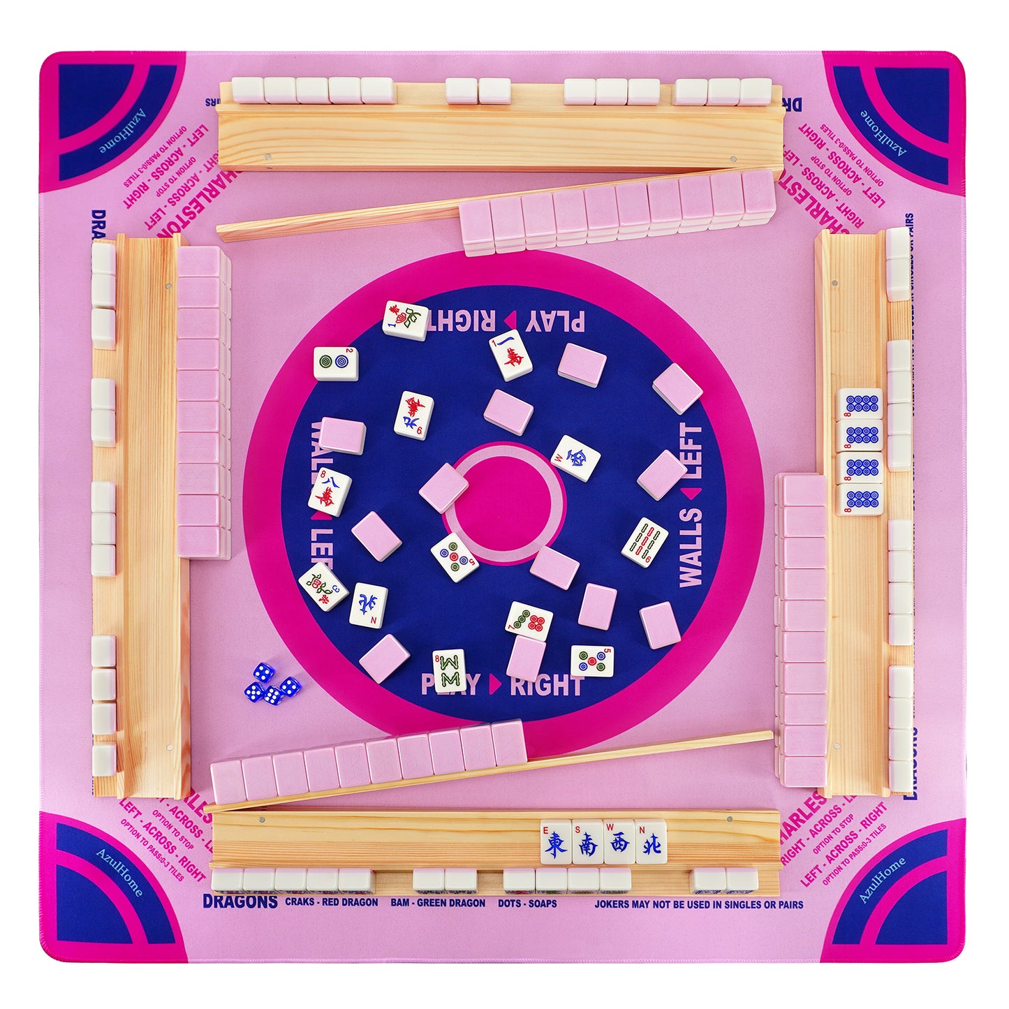 Four player American Mahjong layout with pink play mat, racks, tiles, and dice