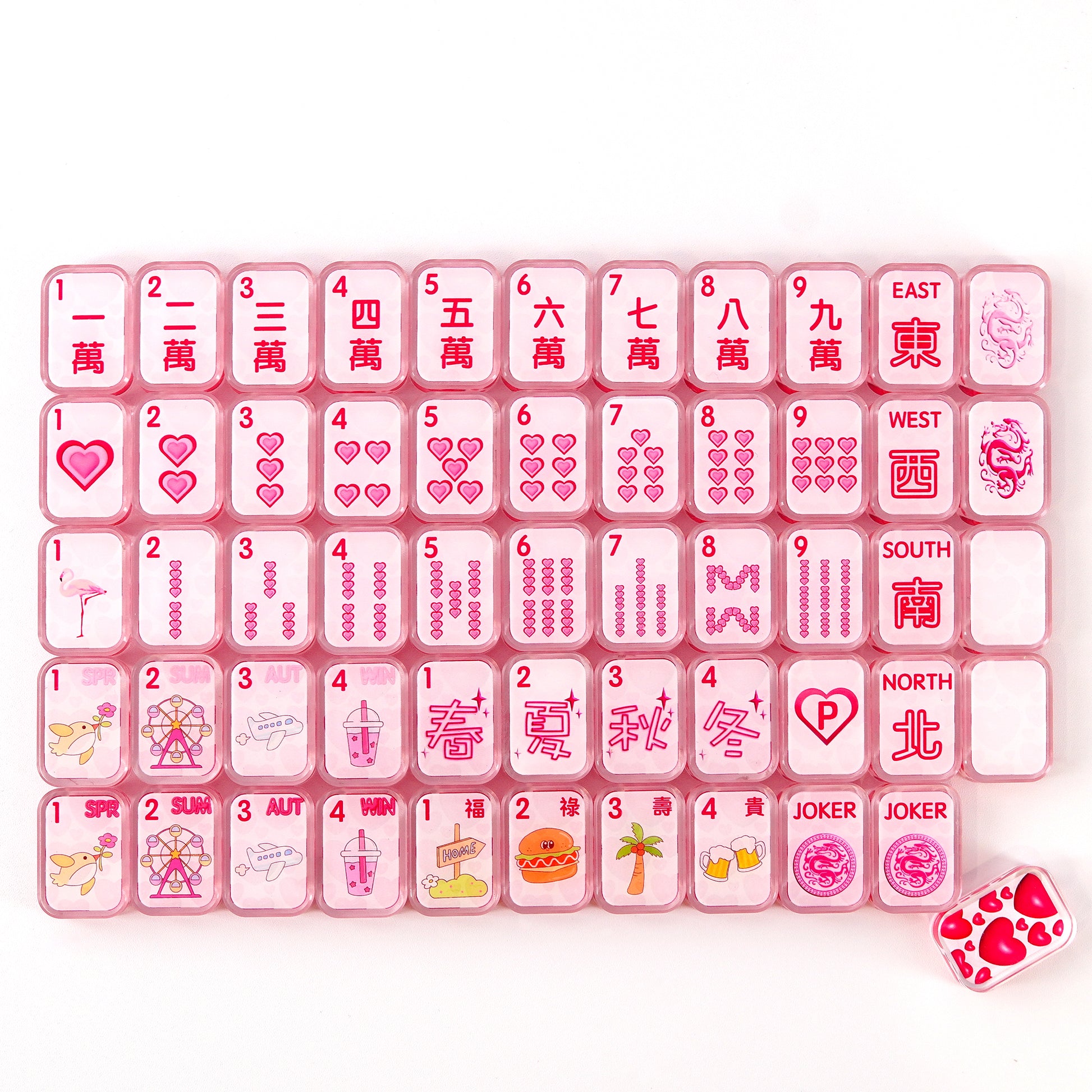 Pink transparent acrylic mahjong tiles made from premium resin with clear engraved patterns