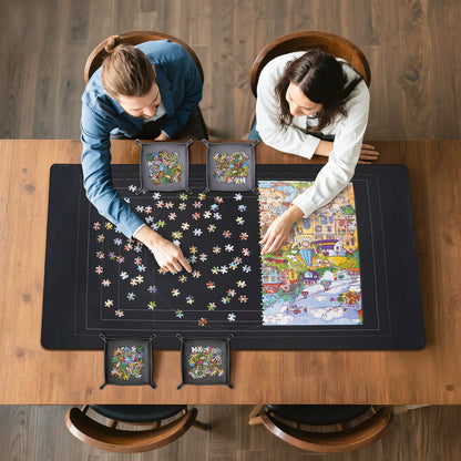puzzle mat used on a table in a casual home setting with two people working on a puzzle
