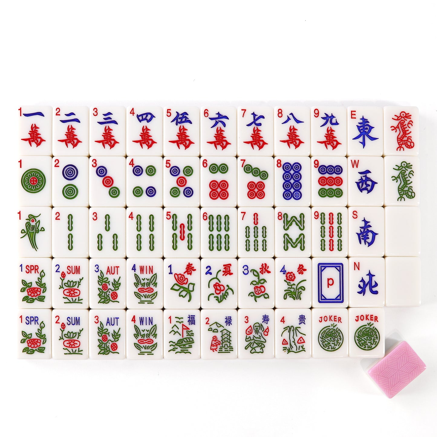 close up of transparent acrylic mahjong tiles with heart inspired pink details