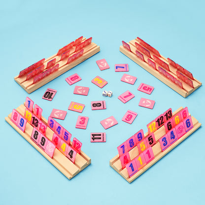 Four player rummy tile game layout with wooden racks and colorful tiles