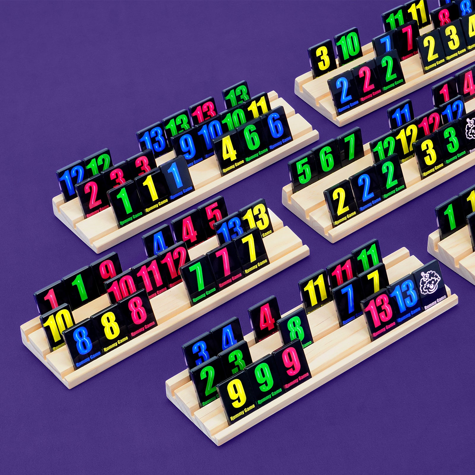 Wooden racks holding colorful numbered tiles for rummy tile game