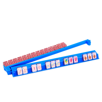 Side view of sky blue acrylic mahjong rack with attached pusher and tiles