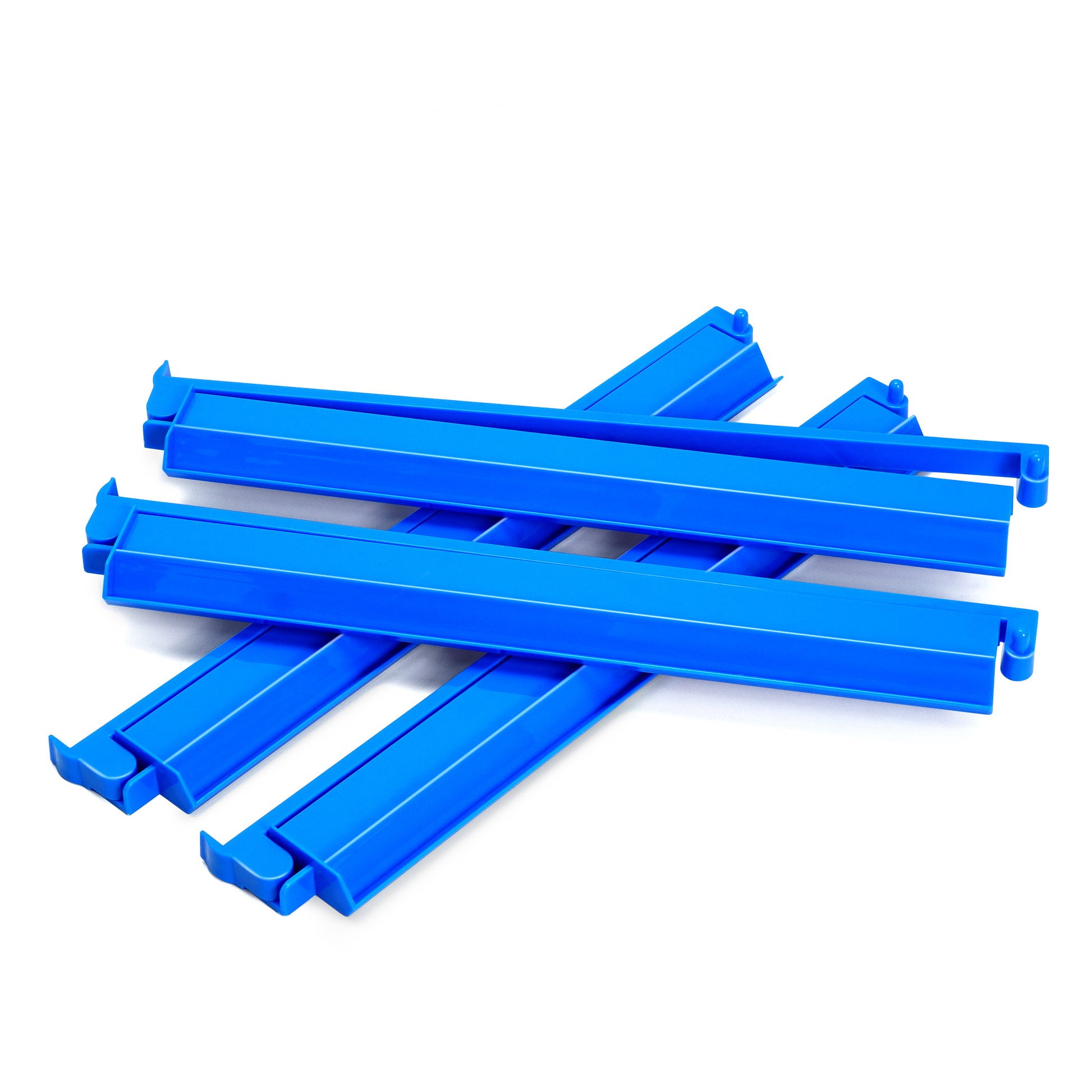 Stacked display of sky blue acrylic mahjong racks and pushers