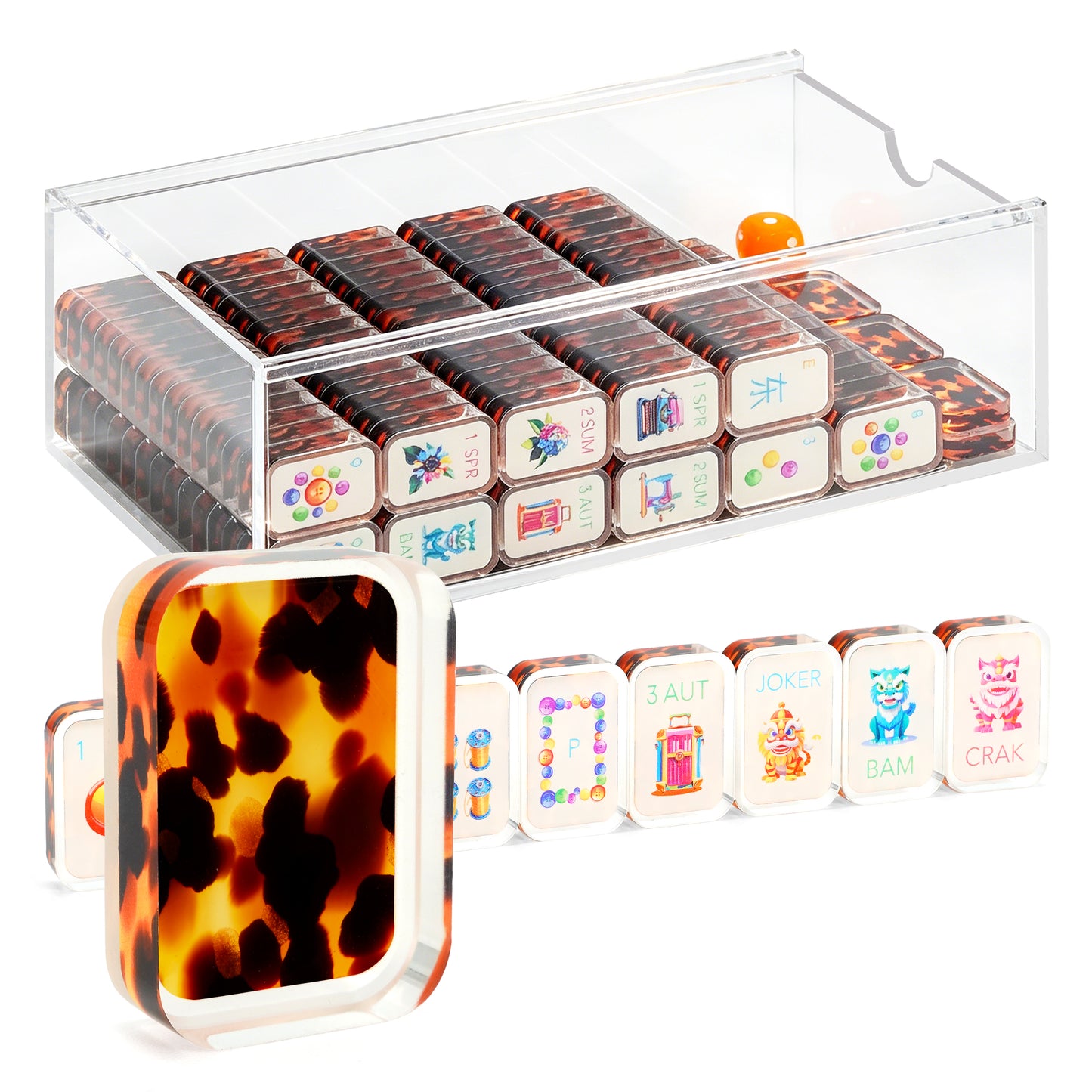 Tortoise shell mahjong set displayed in a clear storage case with tiles and racks