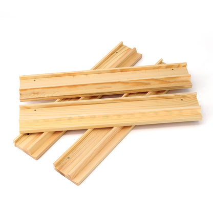 Set of four wooden Mahjong racks arranged neatly for organized tile gameplay